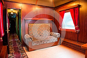 Vintage old sofa in the compartment interior