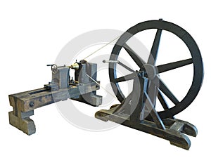 Vintage old turning lathe machine isolated over white background