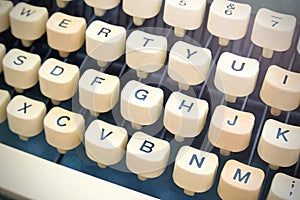 Vintage old typewriter keyboard diagonal rows forming a background