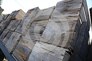 Vintage- old wooden apple crates tilted on truck