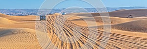 Vintage open top 4x4 SUV in the desert in Dubai, UAE