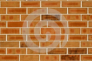 Vintage orange and brown brick wall texture with 1/3 offset pattern