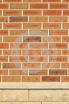 Vintage orange and brown brick wall texture with 1/3 offset pattern