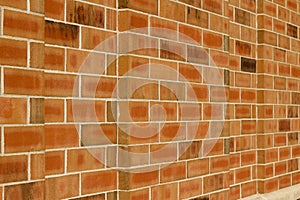 Vintage orange and brown brick wall texture with 1/3 offset pattern