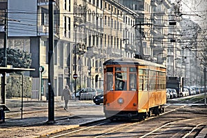 Vintage orange tram in Milan, Italy