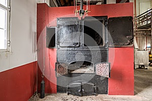 Vintage oven in rum factory in Porto da Cruz, Madeira island.