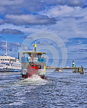 Vintage paddlwheel steamboat painted on the waters of a swamp. WarnemÃÂ¼nde