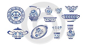 Vintage painting crockery set. Blue porcelain plates, bowls and jar decorated by floral pattern