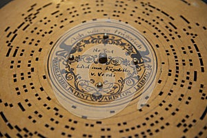 Vintage paper mechanical music disk.