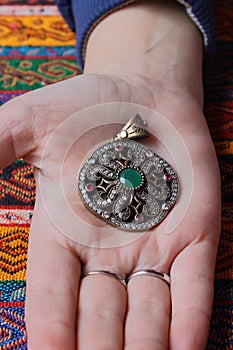 Vintage pendant in hand