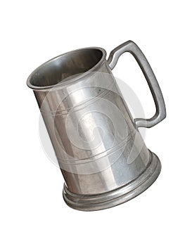 Vintage pewter tankard isolated on white.