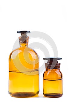 Vintage pharmacy bottles on white background