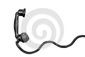 Vintage phone hanset with cord on white
