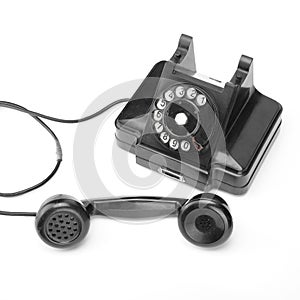 Vintage Phones - Black retro phone is picked up square image