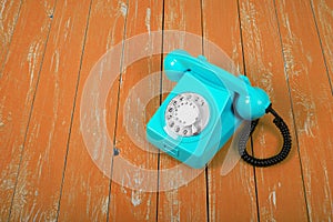 Vintage Phones - Blue retro telephone orange background