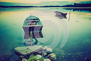 Vintage photo of beautiful lake sunset