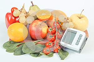 Vintage photo, Blood pressure monitor and fruits with vegetables, healthy lifestyle