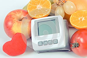 Vintage photo, Blood pressure monitor and fruits with vegetables, healthy lifestyle