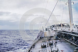 Vintage photo circa 1960s, ship listing to port.