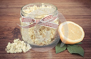 Vintage photo, Elderberry flowers and lemon for preparing fresh healthy juice