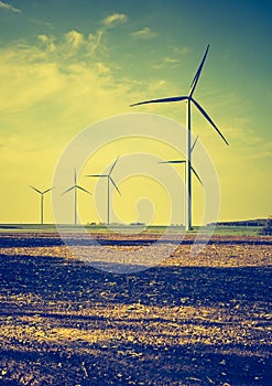 Vintage photo of field with windmills