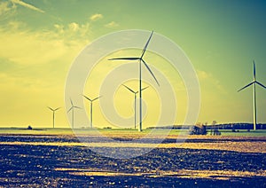 Vintage photo of field with windmills