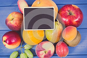 Vintage photo, Fresh natural fruits containing nutritious vitamins and black board for text, healthy lifestyles concept