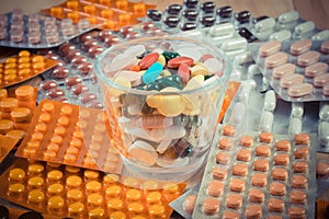Vintage photo, Heap of colorful medical pills and capsules, health care concept
