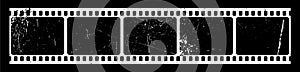 Vintage photographic film with scratches on a black background. Vector illustration