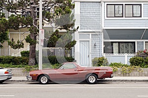 A vintage pick up car in the street in Venice, California photo