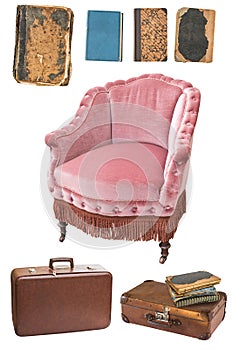 Vintage pink armchair, books, suitcases isolated on white background