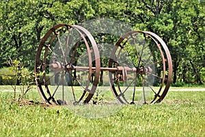 Vintage Planter Wheels in a Country Field