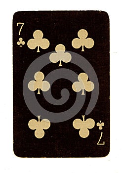 A vintage playing card in black and gold. photo