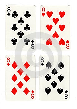 Vintage playing cards showing four eights.