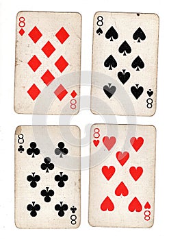 Vintage playing cards showing four eights.