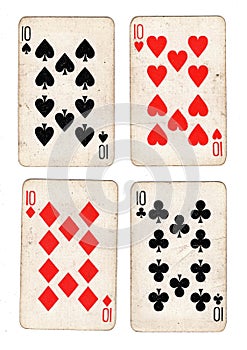 Vintage playing cards showing four tens.
