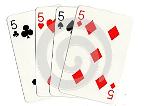 Vintage playing cards showing a hand of four fives.