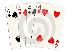 Vintage playing cards showing a hand of four fours.
