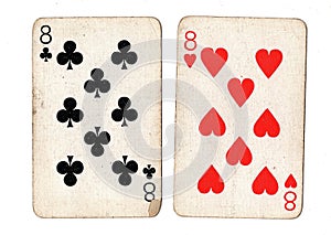 Vintage playing cards showing a pair of eights.