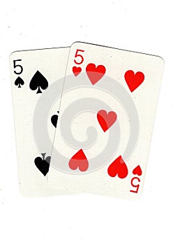 Vintage playing cards showing a pair of fives.