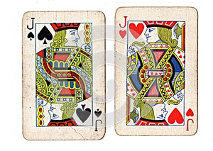 Vintage playing cards showing a pair of jacks.