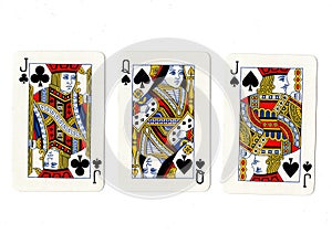 Vintage playing cards showing a pair of jacks and a queen.