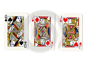 Vintage playing cards showing a pair of jacks and a queen.