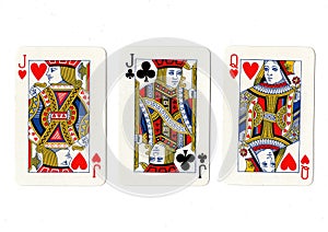 Vintage playing cards showing a pair of jacks and a queen.