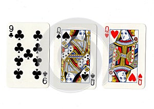 Vintage playing cards showing a pair of queens and a nine.