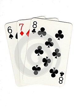 Vintage playing cards showing a three card run in different suits.