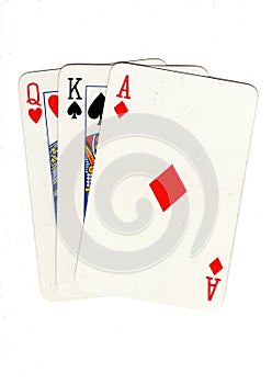 Vintage playing cards showing a three card run in different suits.