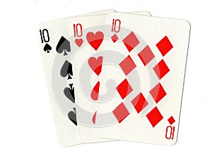 Vintage playing cards showing three tens.