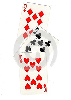 Vintage playing cards showing three tens.