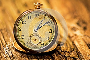 Vintage Pocket Watch On Antique Wood